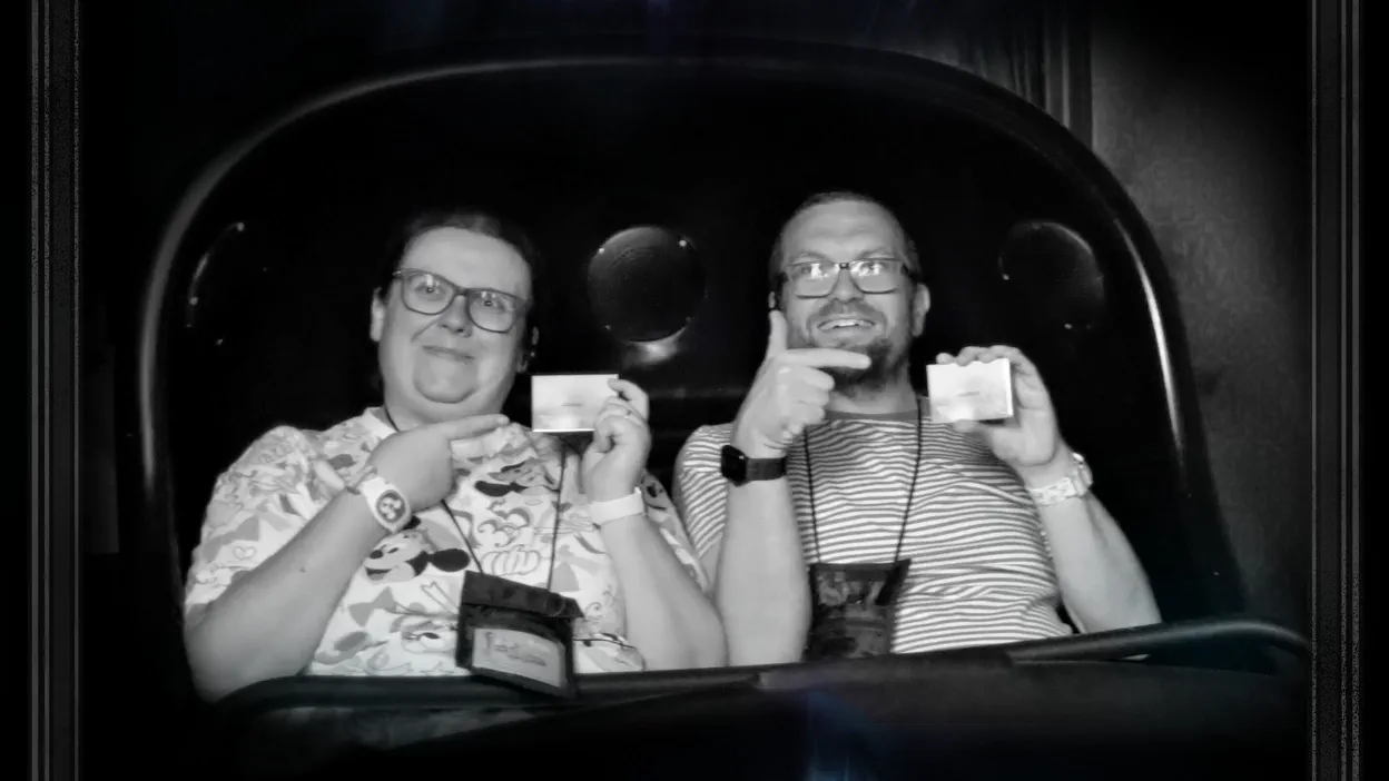 Us on Haunted Mansion, showing our tour badges.